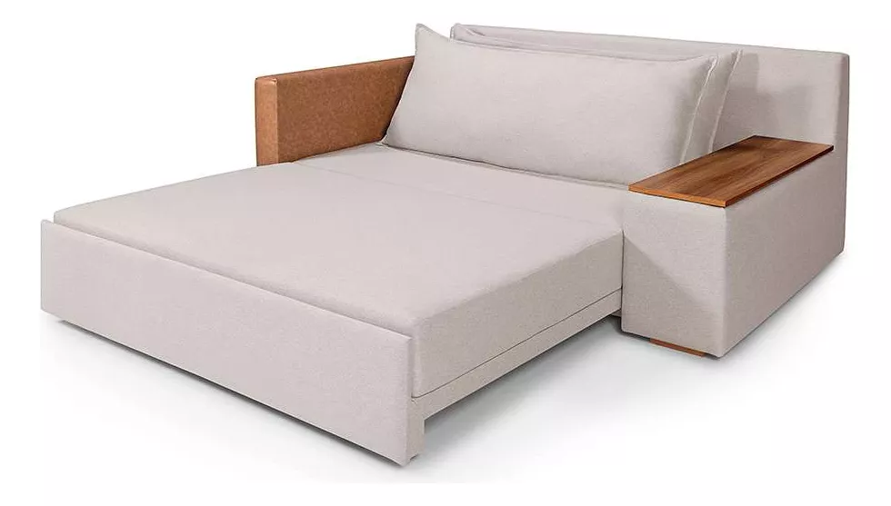 A imagem apresenta um sofá cama elegante com baú lateral, projetado para conforto e estilo, ideal para compor a decoração de ambientes. Descubra os melhores sofás!