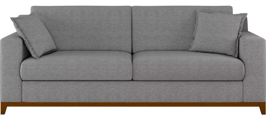 Sofá cinza elegante com almofadas, ideal para ambientes modernos. Conheça os melhores sofás que combinam conforto e estilo.